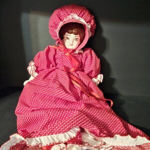 Red and White Antique Porcelain Doll